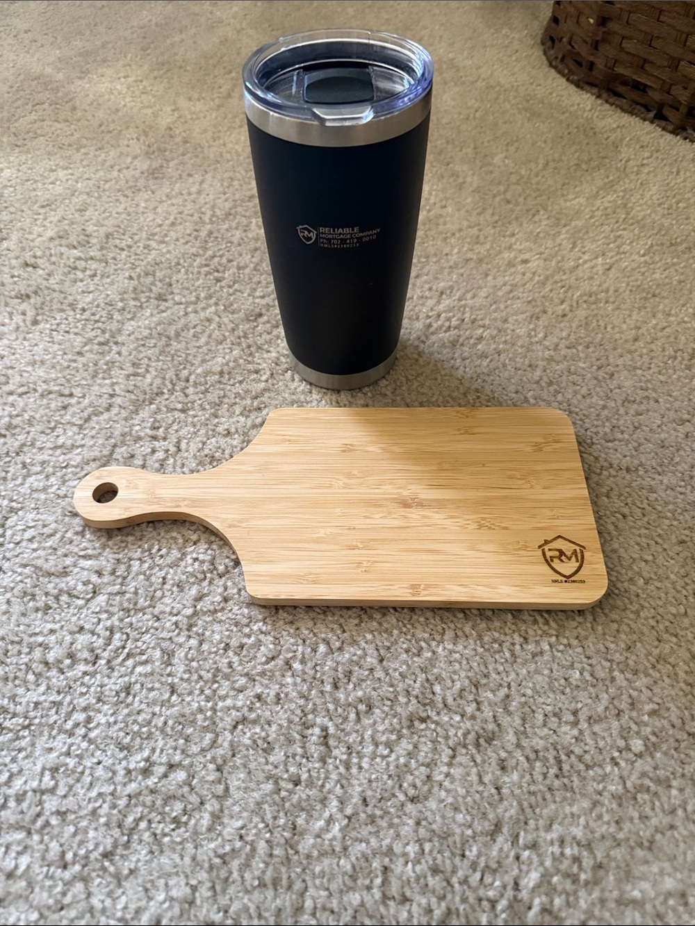 To go coffee mug and wooden cutting board